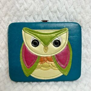 Owl seen on pieces hard sided clasp closure